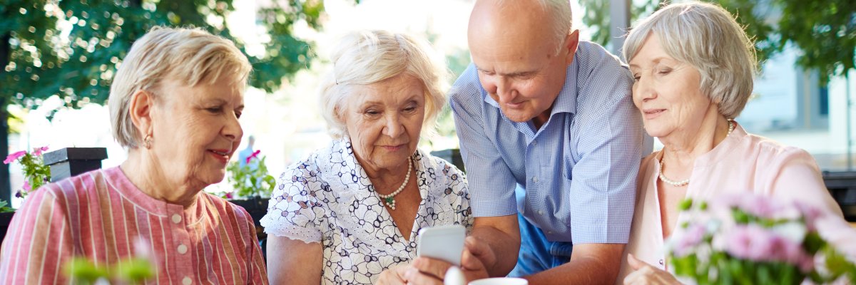 Modern seniors with smartphone